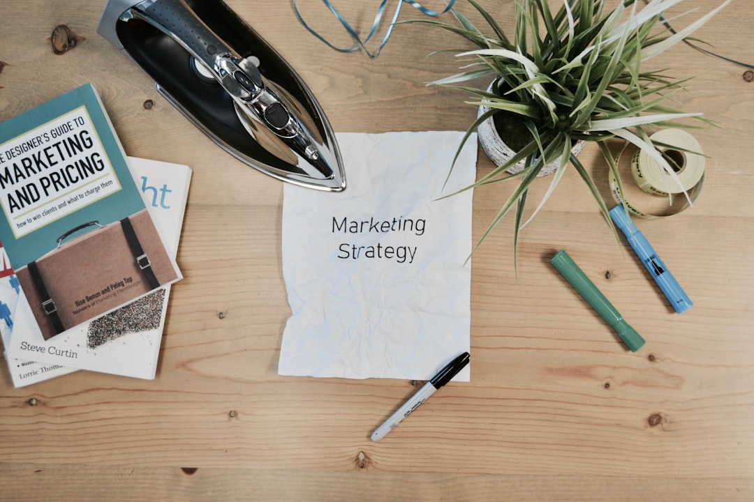 budget-friendly-marketing-plan-featured.jpg white printing paper with Marketing Strategy text