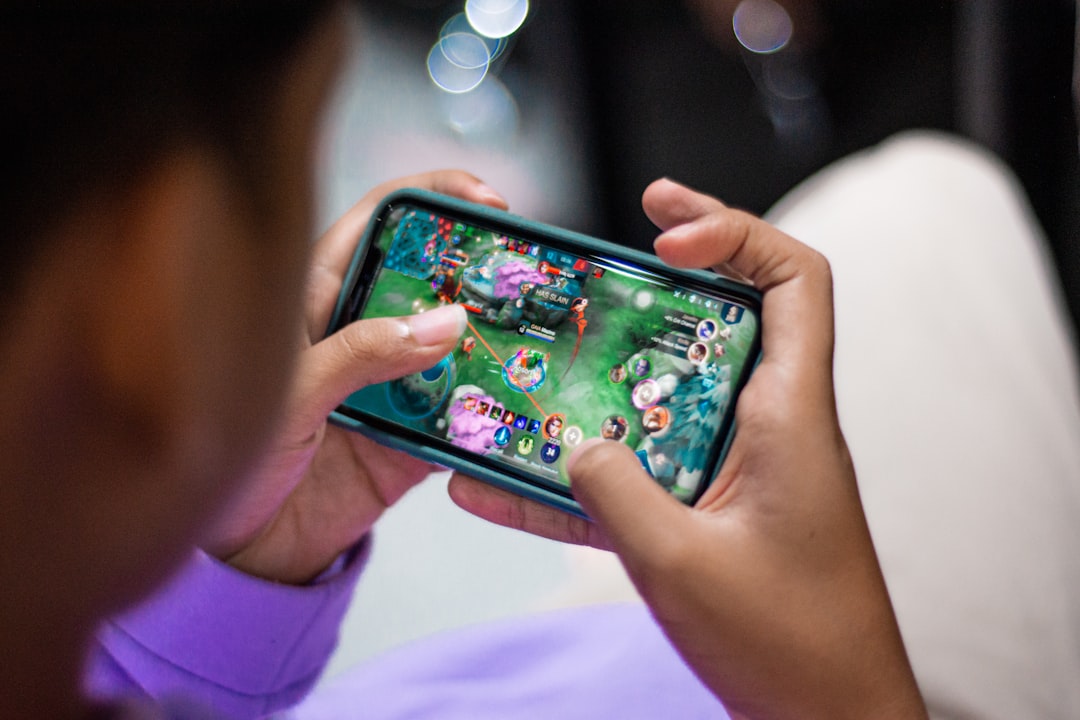 interactive-puzzles-content-marketing.jpg a person holding a cell phone in their hands